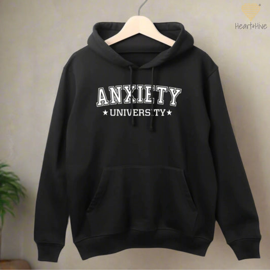 Black hoodie with 'Anxiety University' in bold, white collegiate font, framed by small stars.