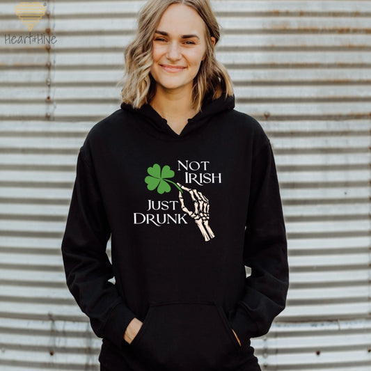 Black hoodie with skeleton hand holding a four-leaf clover that says 'Not Irish Just Drunk' in a distressed text.