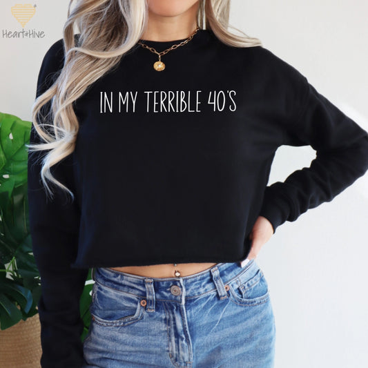 Black cropped sweatshirt with the phrase "IN MY TERRIBLE 40’S" in white text