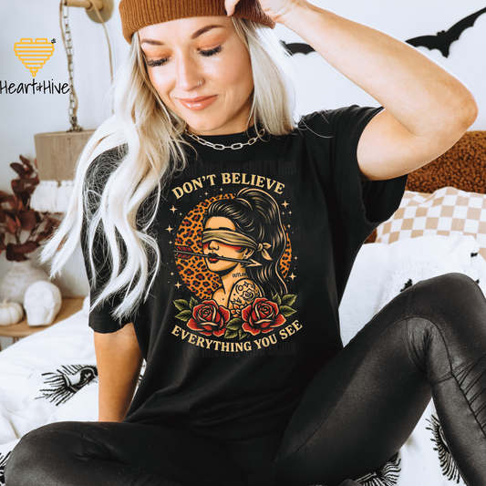 Don't Believe Everything You See Women's Graphic Tee / Black Unisex Bella & Canvas Tee