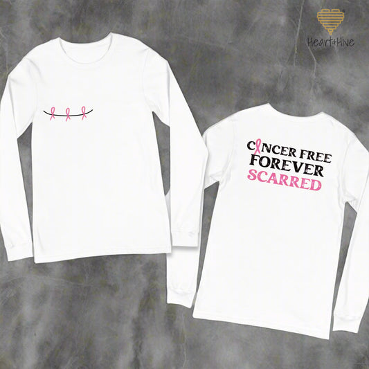 White long-sleeve shirt with pink ribbon mastectomy scar design on the front and vintage bold black font stating cancer free forever scarred. Scarred is in pink font. small pink ribbon as the a in cancer