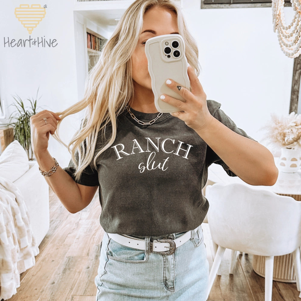 Pepper comfort colors tee with, 'Ranch Slut' with Ranch written in a Western font and slut written in a cute cursive text. 